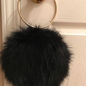 Black faux fur purse.